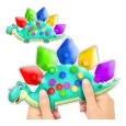 Juguete sensorial y clasificación de colores Estegosaurios